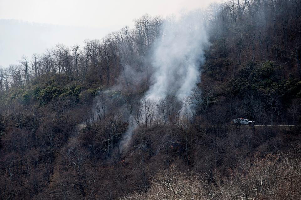 A wildfire burns near the Blue Ridge Parkway in this file photo. An Asheville Citizen Times reader asks how residents can protect their homes from wildfire risk.