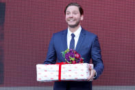 <p>Daniel Bruehl receives a birthday present at the <em>Next Door</em> (<em>Nebenan) </em>premiere during the 71st Berlinale International Film Festival Summer Special at Freiluftkino Museumsinsel on June 16 in Berlin.</p>