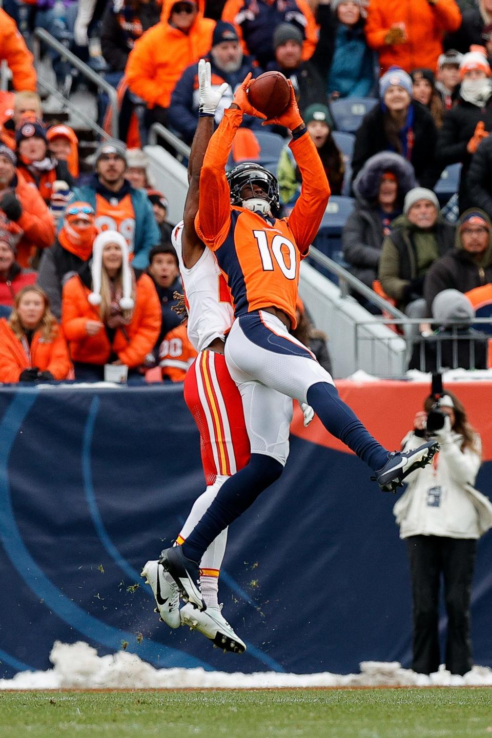 Denver Broncos wide receiver Jerry Jeudy (10) makes a catch under pressure from Kansas City Chiefs safety Justin Reid (20) on Oct. 29, 2023, in Denver.