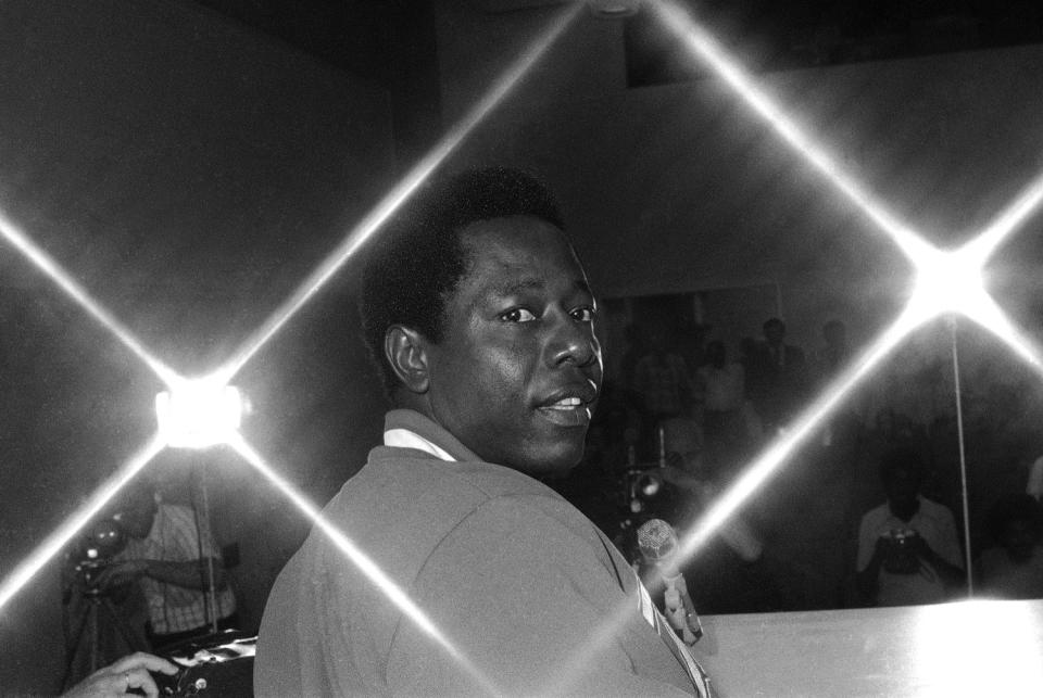 Atlanta Braves' Hank Aaron looks on during a news conference April 1, 1974, in New Orleans.