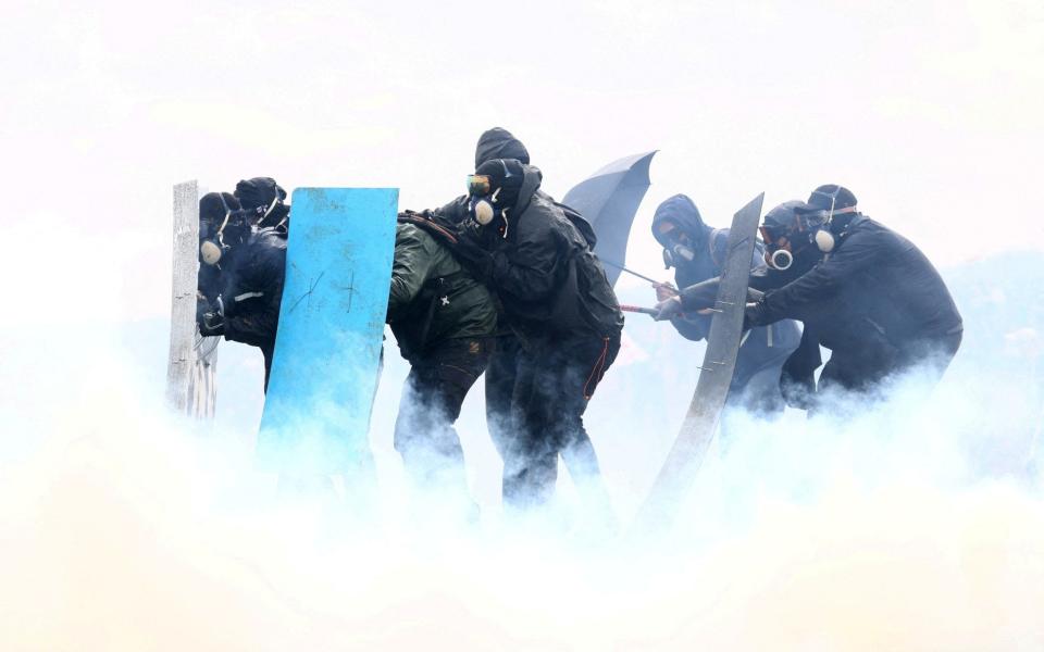 Protesters attend a demonstration called by the collective "Bassines Non Merci" against the "basins" on the construction site of new water storage infrastructure for agricultural irrigation in Sainte-Soline - AFP