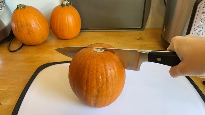 Pumpkin being cut
