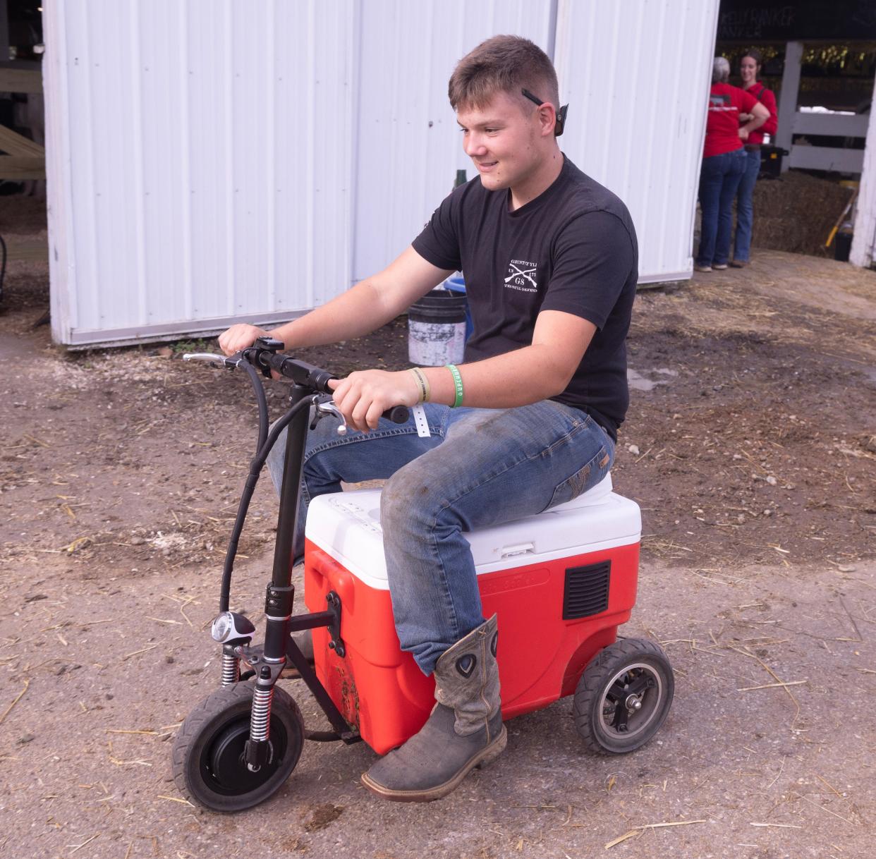 Landon Kiplinger, a Tuslaw High School senior, rides a cooler around the Stark County Fair Tuesday, August 27, 2024.