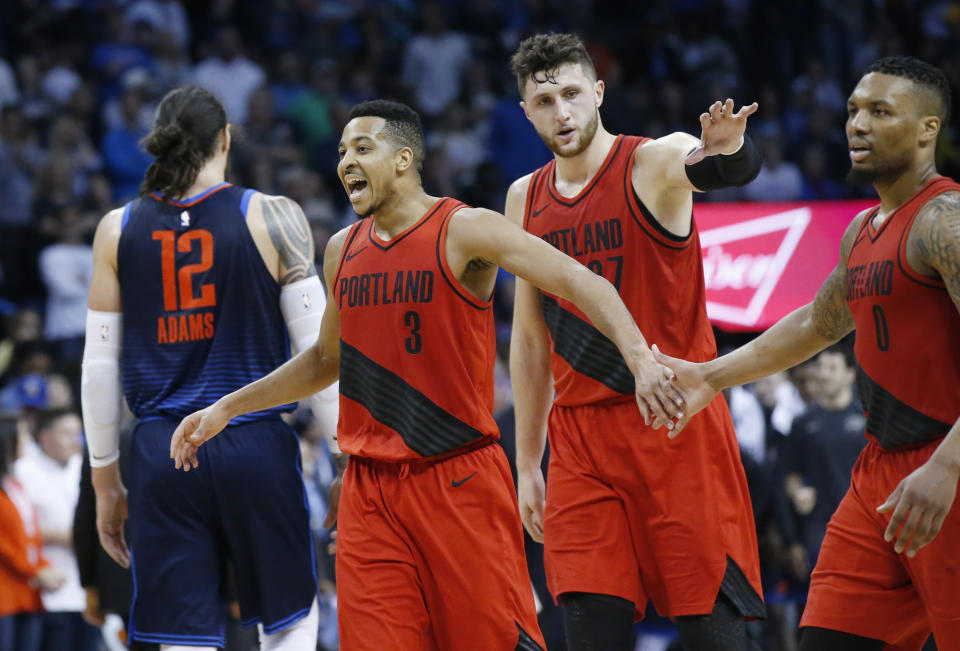 After an odd summer, is trouble on the way for C.J. McCollum and Damian Lillard in Portland? (AP)