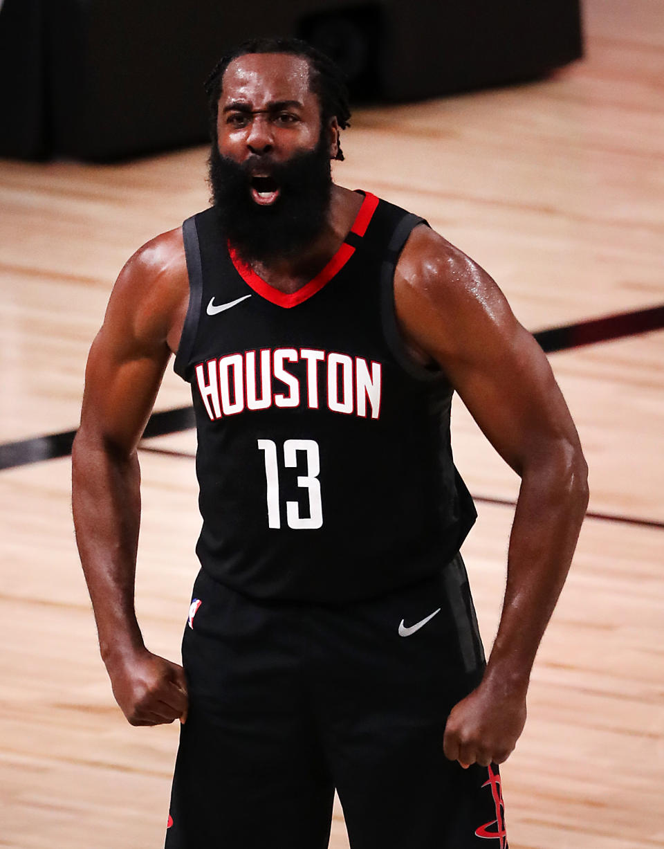 Rockets star James Harden reacts after making the game-saving block. (Mike Ehrmann/Getty Images)