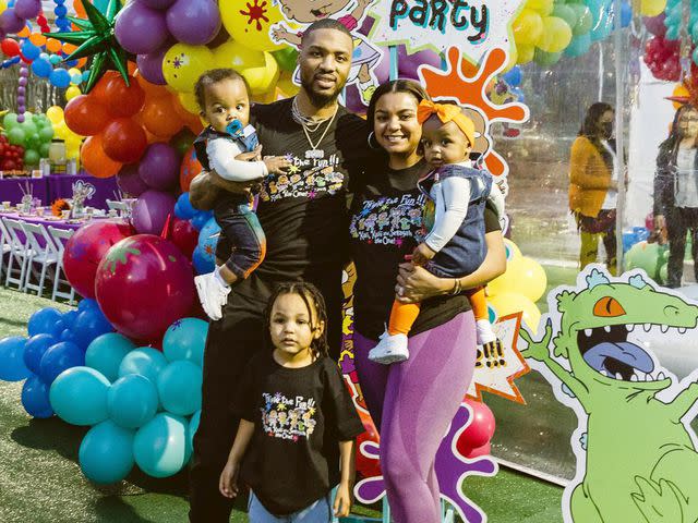 Damian Lillard Instagram Damian Lillard and Kay'la Hanson with their three children at a birthday party.