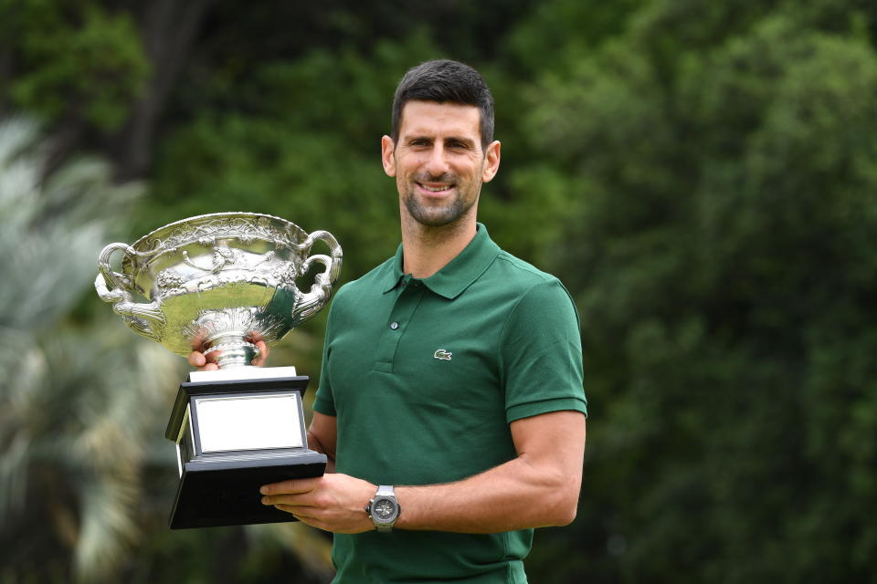 MELBOURNE, AUSTRALIA - JANUARY 30: Novak Djokovic of Serbia poses with the Norman Brookes Challenge Cup at Government House after winning the 2023 Australian Open at Melbourne Park on January 30, 2023 in Melbourne, Australia. (Photo by James D. Morgan/Getty Images)