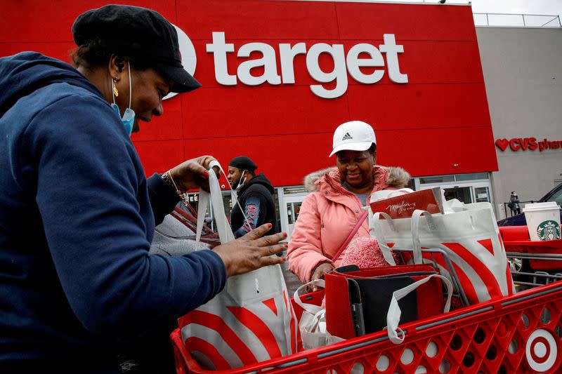 FILE PHOTO: Shoppers exit a Target store during Black Friday sales in Brooklyn, New York