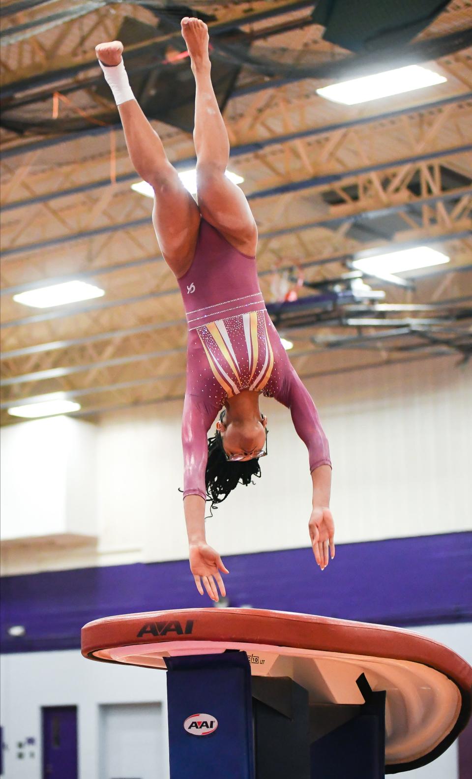 Bloomington North’s Dede Eberle competes on the vault during the gymnastics meet against Bloomington South and Edgewood at South on Monday, Jan. 8, 2024.