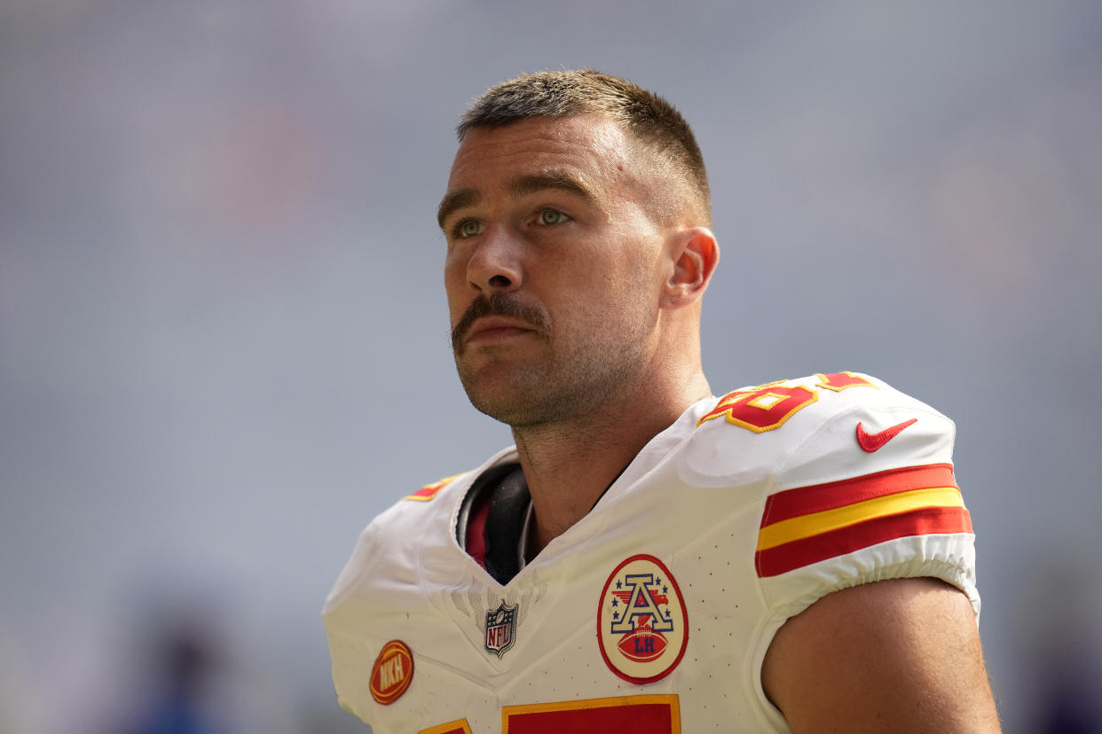 Kansas City Chiefs tight end Travis Kelce (87) stands on the field before an NFL football game against the Minnesota Vikings Sunday, Oct. 8, 2023, in Minneapolis. (AP Photo/Abbie Parr)