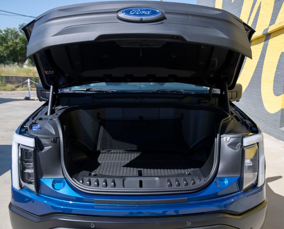 The new Ford F-150 Lightning, an all-electric truck, is parked outside the Edge Motor Museum on Wednesday, June 29, 2022, in Memphis. The truck features front storage space as well as a built-in cooler. 