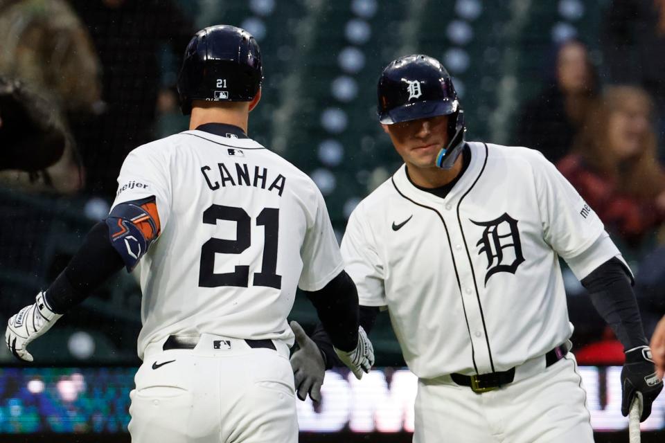 Detroit Tigers designated hitter Mark Canha receives congratulations from first baseman Spencer Torkelson after his home run in the first inning against the Minnesota Twins at Comerica Park, April 12, 2024.