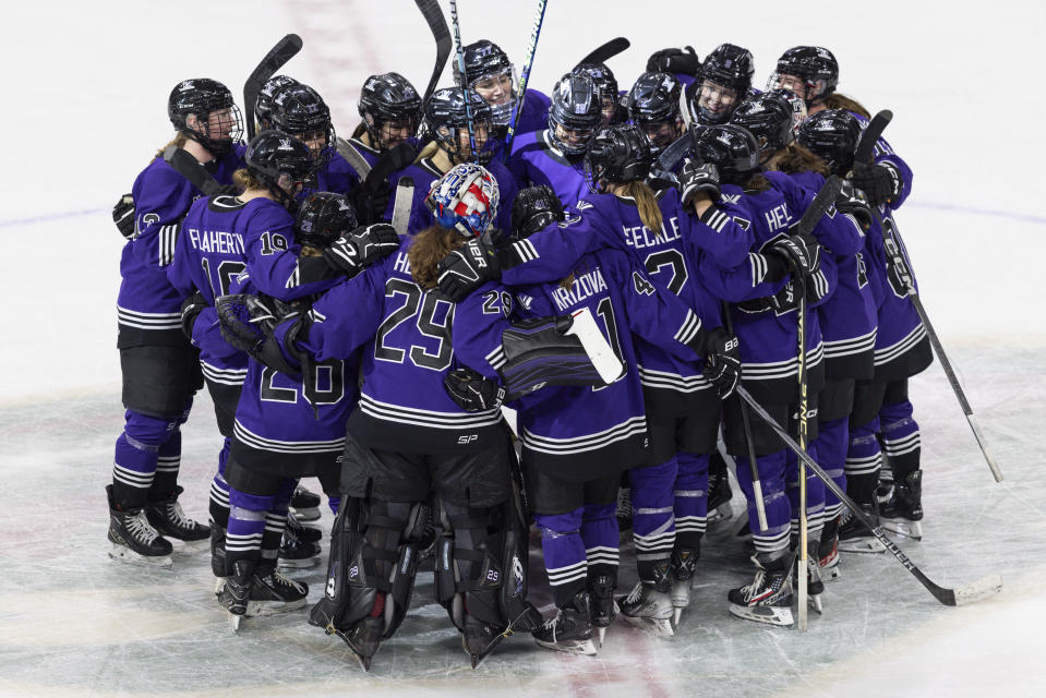 Minnesota celebrates a win against Toronto in a PWHL hockey game Wednesday, Jan. 10, 2024, in St. Paul, Minn. (AP Photo/Bailey Hillesheim)