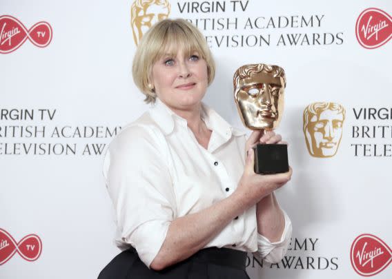 Actress Sarah Lancashire poses with her Bafta for Best Leading Actress at the British Academy Television Awards. (Photo by Joel Ryan/Invision/AP)