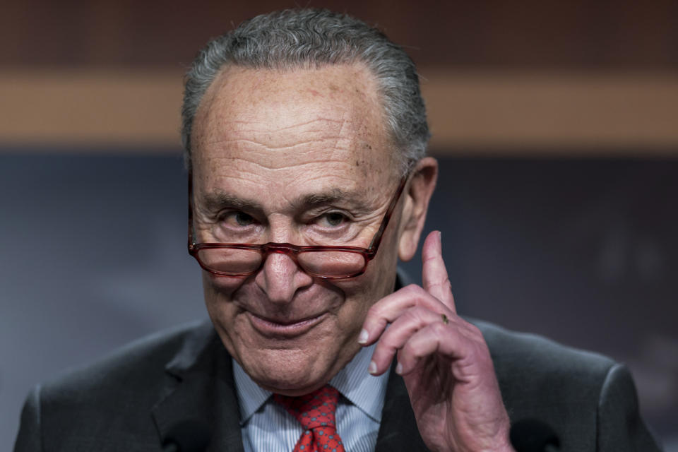 Senate Majority Leader Chuck Schumer, D-N.Y., speaks with reporters after Democratic Sen. Raphael Warnock defeated Republican challenger Herschel Walker in a runoff election in Georgia last night, at the Capitol in Washington, Wednesday, Dec. 7, 2022. Democrats' new outright majority in the Senate means the party will no longer have to negotiate a power-sharing deal with Republicans and won't have to rely on Vice President Kamala Harris to break as many tie votes. (AP Photo/J. Scott Applewhite)