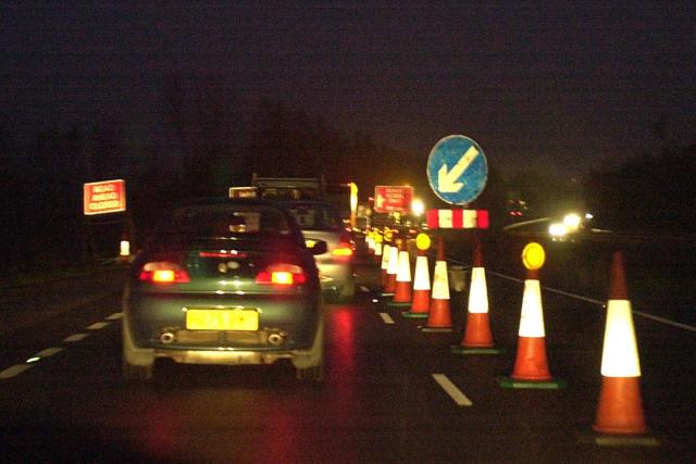 Traffic queuing on A14 after lorry drags roadworks cones onto