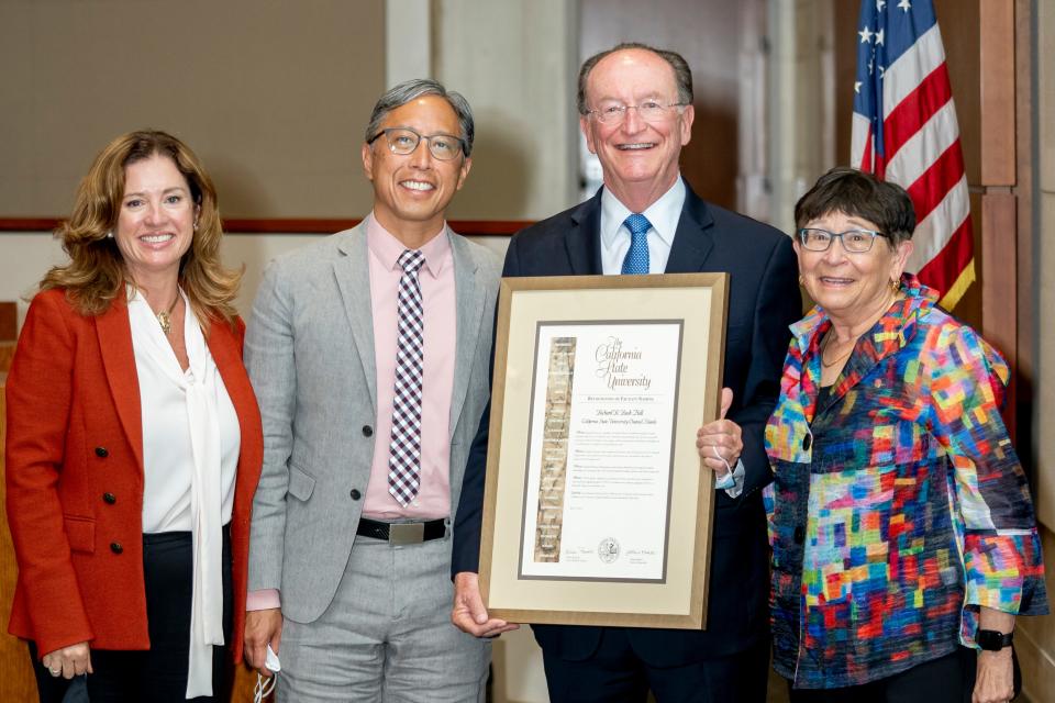 CSU Board Trustee Lillian Kimbell, from left, CSU Channel Islands President Richard Yao, CSU Channel Islands President Emeritus Richard Rush and CSU Interim Chancellor Jolene Koester stand together after a CSUCI building was named for Rush.