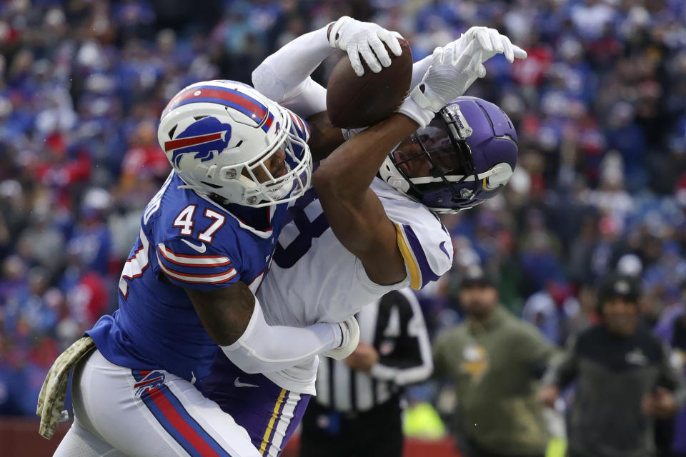 Buffalo Bills cornerback Christian Benford (47) brings down Minnesota Vikings wide receiver Justin Jefferson (18) in the first half of an NFL football game, Sunday, Nov. 13, 2022, in Orchard Park, N.Y. (AP Photo/Joshua Bessex)