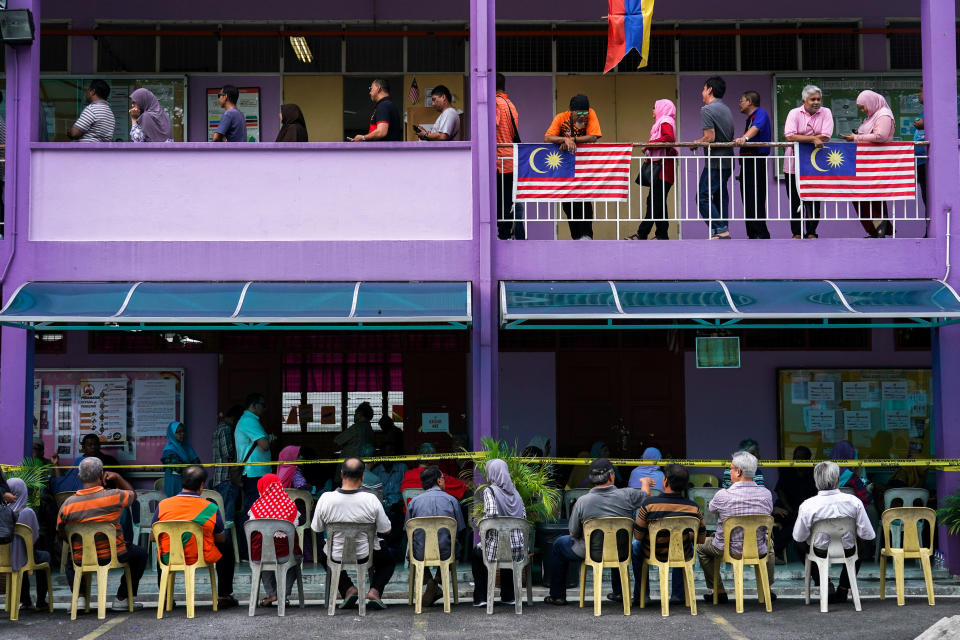 People line up to vote during the general election in Kuala Lumpur May 9, 2018. — Reuters pic