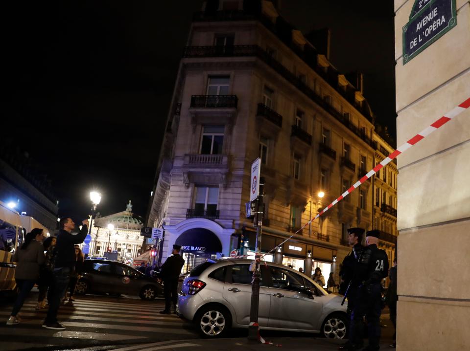 <p>Policemen stand guard in Paris centre after one person was killed and several injured by a man armed with a knife, who was shot dead by police in Paris on May 12, 2018. (Photo: Thomas Samson/AFP/Getty Images) </p>