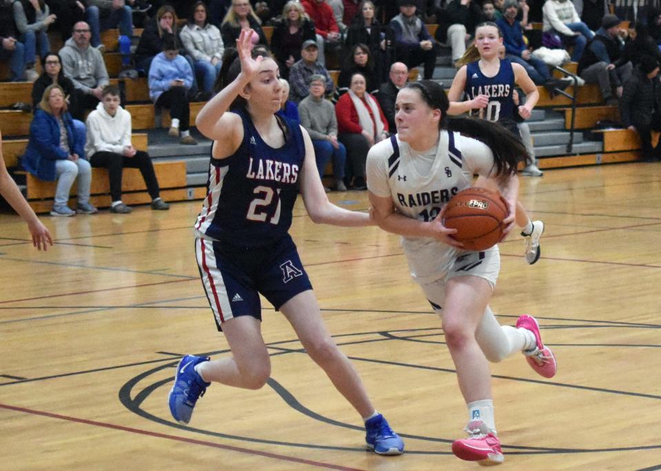 Apponequet's Brooke Generazzo defends Somerset Berkley's Mia Gentile during Tuesday night's South Coast Conference game at Somerset Regional High School.