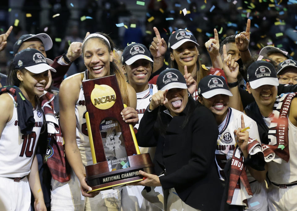 The South Carolina women’s basketball team celebrates its national title last April. (AP)