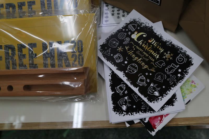 Christmas cards lie on a table next to a free Christmas dinner offered by a local restaurant to protesters in Hong Kong