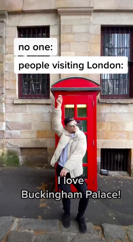 Pavel standing in front of an old school telephone booth with the caption "I love Buckingham Palace!"