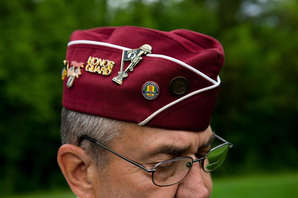 Jerry Primmer, of Sugar Grove, is the trumpet player for the Lancaster Veteran Burial Detail stands in the cemetery with his trumpet at Trinity Lutheran Church (Sponagle) in Sugar Grove, Ohio on May 20, 2022. Primmer was a firefighter for the Lancaster Fire Department for 33 years. He also served in the Army Reserves from 1966 to 1972.