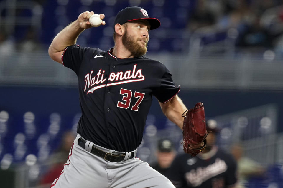 FILE - Washington Nationals starting pitcher Stephen Strasburg throws during the first inning of a baseball game against the Miami Marlins, on June 9, 2022, in Miami. Nationals general manager Mike Rizzo says Strasburg’s status for 2023 is up in the air after a series of injuries limited the pitcher to one start this season. (AP Photo/Marta Lavandier, File)