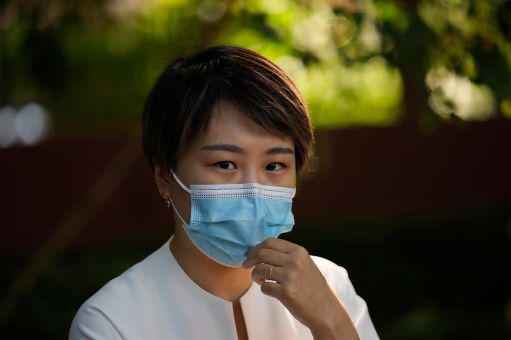 Teresa Xu prepares to attend a court session at the Chaoyang People's Court in Beijing (Copyright 2021 The Associated Press. All rights reserved)