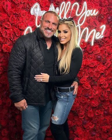 <p>Dolores Catania/Instagram</p> Frank Catania and Brittany Mattessich pose after getting engaged.