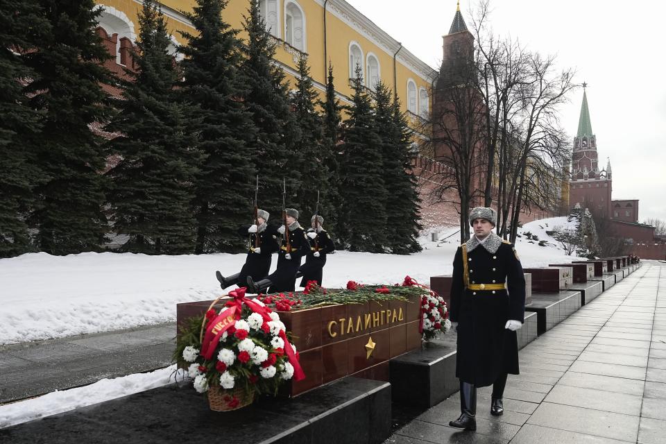 Members of honor guard march at the Tomb Stalingrad during a wreath-laying ceremony at the Tomb of the Unknown Soldier near the Kremlin Wall attending commemorations marking the 80th anniversary of the Soviet victory in the battle of Stalingrad in Moscow, Russia, Thursday, Feb. 2, 2023. The battle of Stalingrad turned the tide of World War II and is regarded as the bloodiest battle in history, with the death toll for soldiers and civilians estimated at about 2 millions. (AP Photo/Alexander Zemlianichenko)