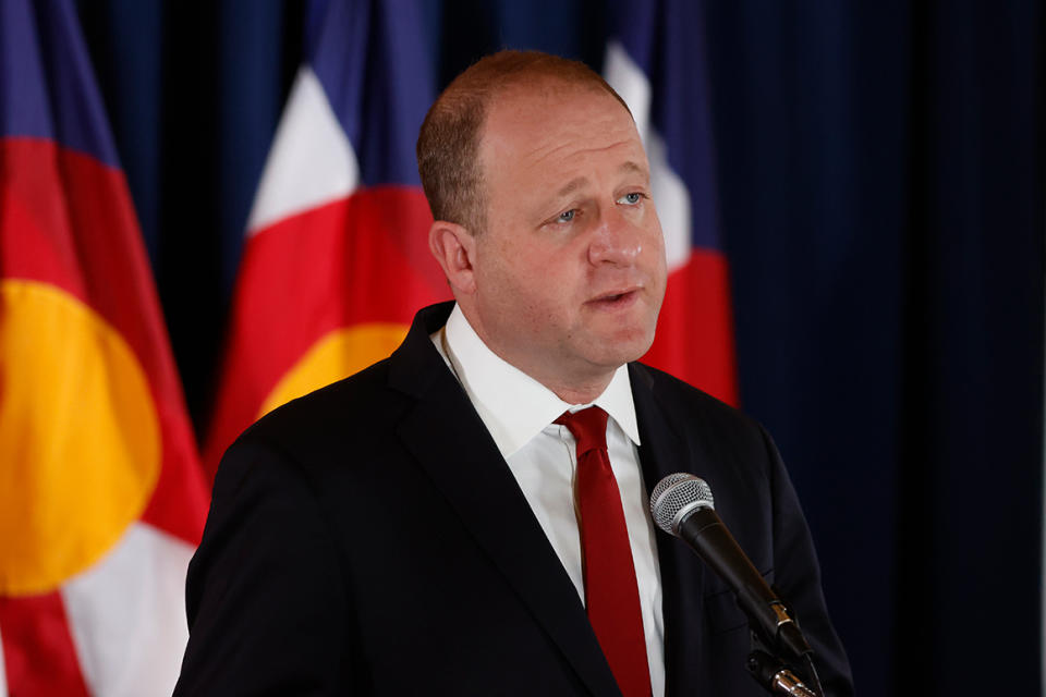 Colorado Governor Jared Polis makes a point during a news conference to update the state's efforts to control the spread of the new coronavirus Friday, May 15, 2020, in the State Capitol in Denver. (AP Photo/David Zalubowski)