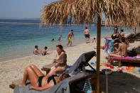 Beaches officially reopen to the public, in Athens