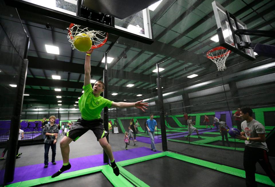 Tyler Luebke slam dunks at Xtreme Air in Appleton.