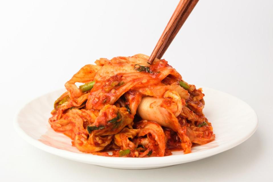 Next up are fermented foods — like kimchi, pictured here — which often contain probiotics that have been shown to improve immune function, promote gut health, and aid digestion. Ã¬âÂ±Ã«Â¯Â¼ Ã¬Â â¢ – stock.adobe.com