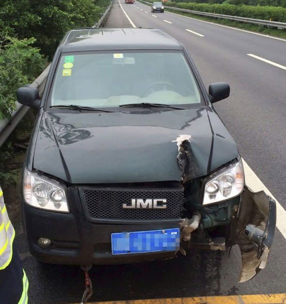 Mandatory Credit: Photo by Imaginechina/REX Shutterstock (4850359c)The car with the damage caused by the circular saw bladeCircular saw blade slices into car after falling off truck, Chongqing, China - 17 Jun 2015A man in western China had a close shave after his car was hit by a massive circular saw blade while he was driving along the road. The motorist was driving to Chongqing when he heard a bang come from the opposite lane before spotting a huge circular bouncing through the bushes of the central reservation. The blade then smashed into the front of his vehicle, slicing around 50cm into the bonnet. Highway police said another truck had crashed in the opposite lane and the blade had been thrown off the vehicle and into the road.