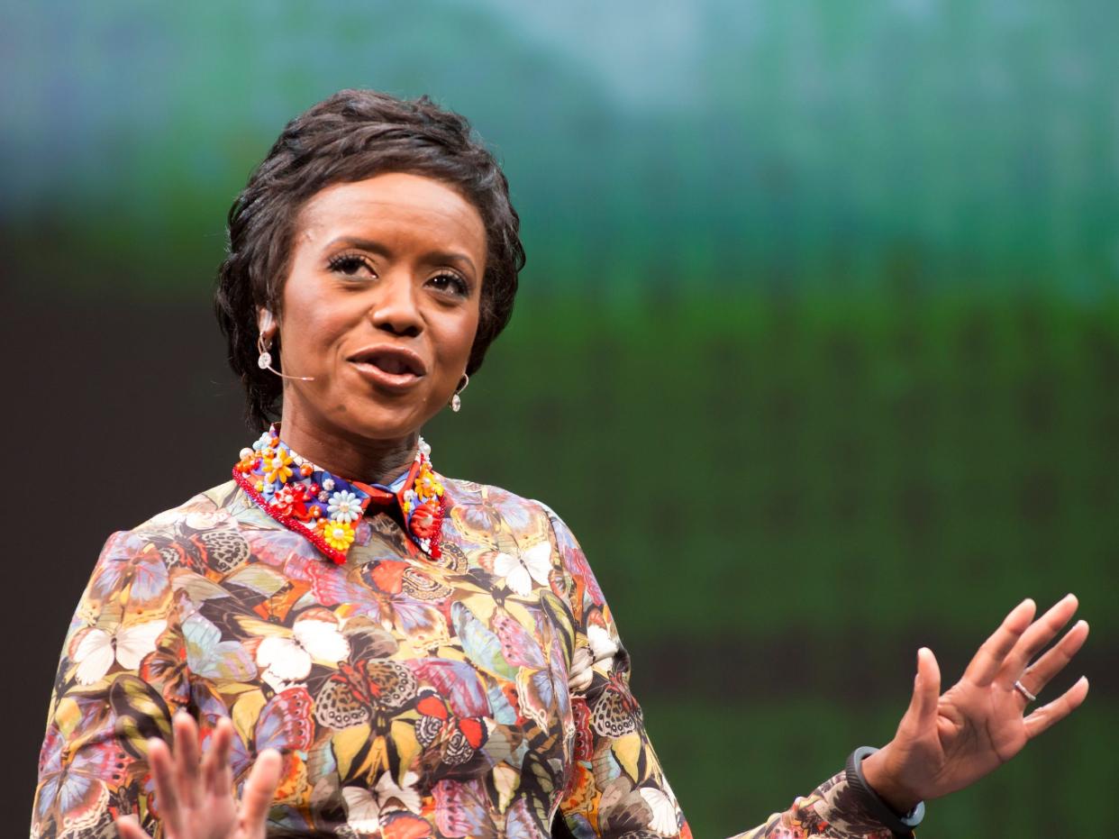 Mellody Hobson gestures while looking into distance while speaking onstage