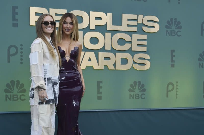 Chrishell Stause (R) and G Flip attend the People's Choice Awards on Sunday. Photo by Jim Ruymen/UPI