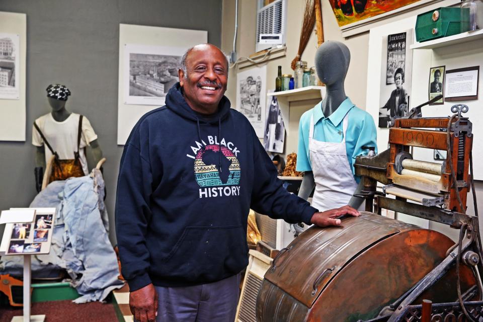 Clayborn Benson, the founder of the Wisconsin Black Historical Society and Museum, at one of the exhibits in the museum that dates back to 1900.