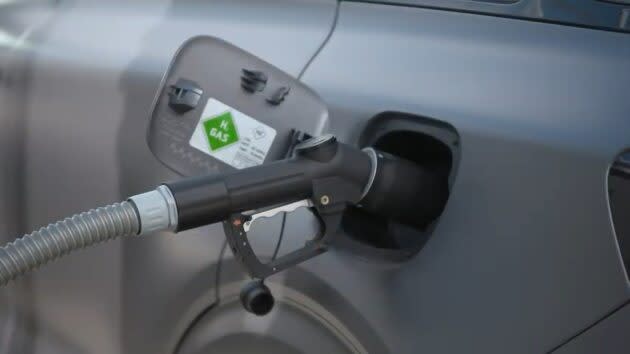 A hydrogen-powered car fills up at a refueling station built at Johnson Matthey’s manufacturing site in Swindon, England. (Johnson Matthey via YouTube)