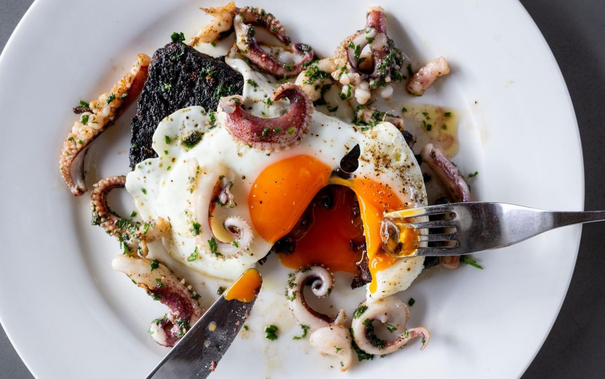 Black pudding with buttery squid and a fried egg