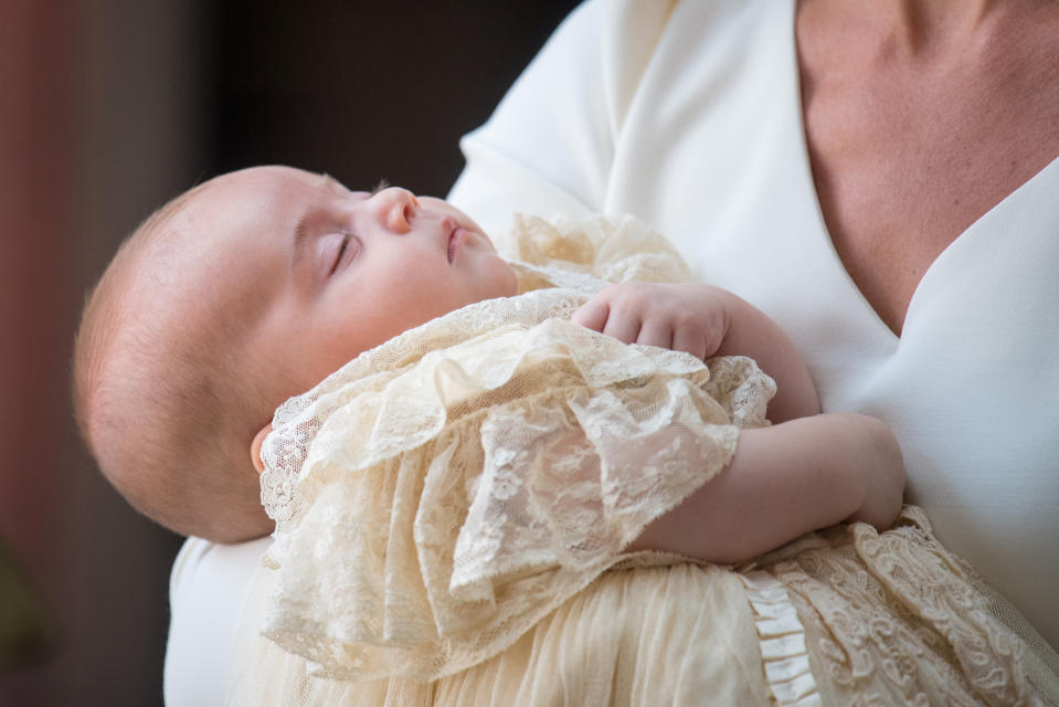 Britain's Catherine, the Duchess of Cambridge, carries Prince Louis as they arrive for his christening service at the Chapel Royal, St James's Palace, London, Britain, July 9, 2018. Dominic Lipinski/Pool via REUTERS