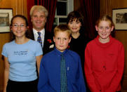 Left to right: Kirsty Bonham, MP for New Forest West Desmond Swayne, Edward Morris and Megan Sharp, pose for photos with the British Prime Minister's wife, Cherie Blair, during a tea party at Downing Street.