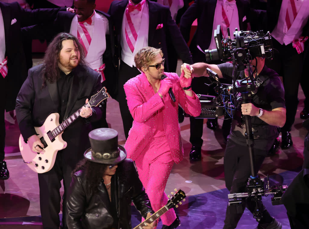 HOLLYWOOD, CALIFORNIA - MARCH 10: (L-R) Wolfgang Van Halen, Slash and Ryan Gosling perform 'I'm Just Ken' from "Barbie" onstage during the 96th Annual Academy Awards at Dolby Theatre on March 10, 2024 in Hollywood, California. (Photo by Kevin Winter/Getty Images)