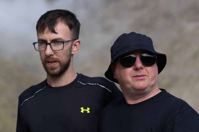 Jay's brother Zac, 21, and dad Warren visit the search area