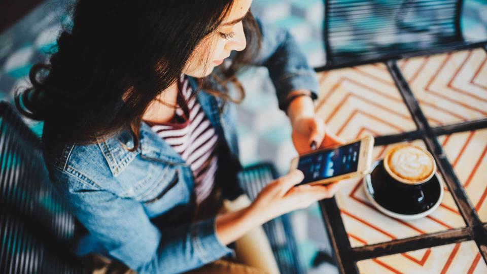 Millennials woman working in coffeeshop.