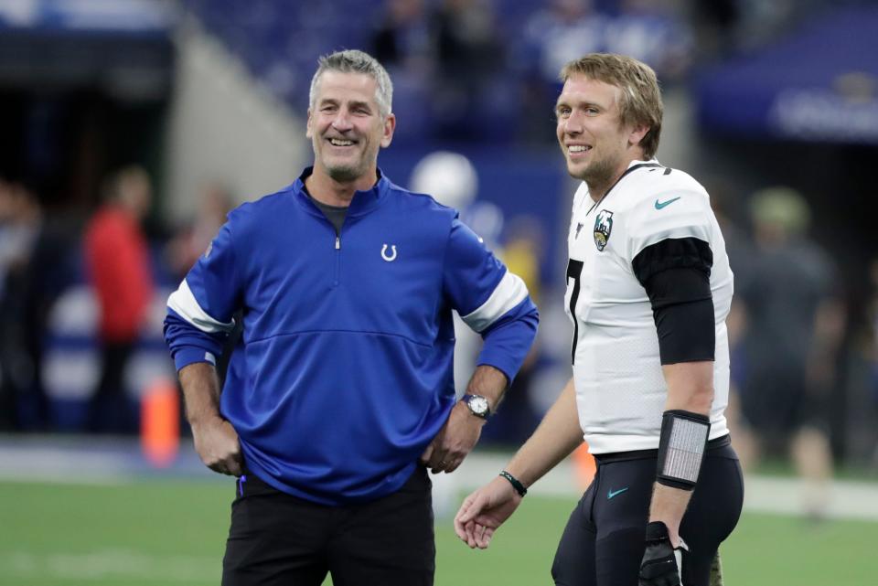 Indianapolis Colts head coach Frank Reich talks with Jacksonville Jaguars quarterback Nick Foles (7) before an NFL football game, Sunday, Nov. 17, 2019, in Indianapolis.