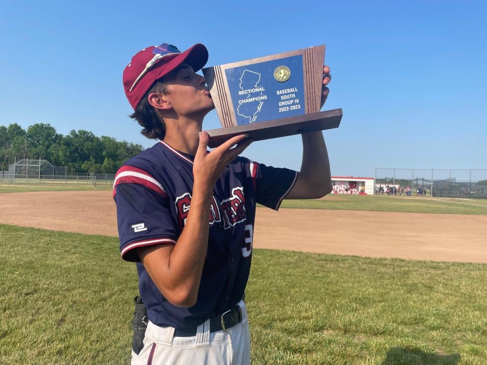Eastern pitcher Pat Karbach kisses the South Jersey Group 4 championship trophy after the Vikings defeated Rancocas Valley 2-0 in the final on Friday, June 2, 2023.